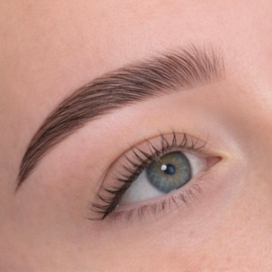 Clean defined brow shape and natural lashes — brow treatment result at Victoria Winham Kent
